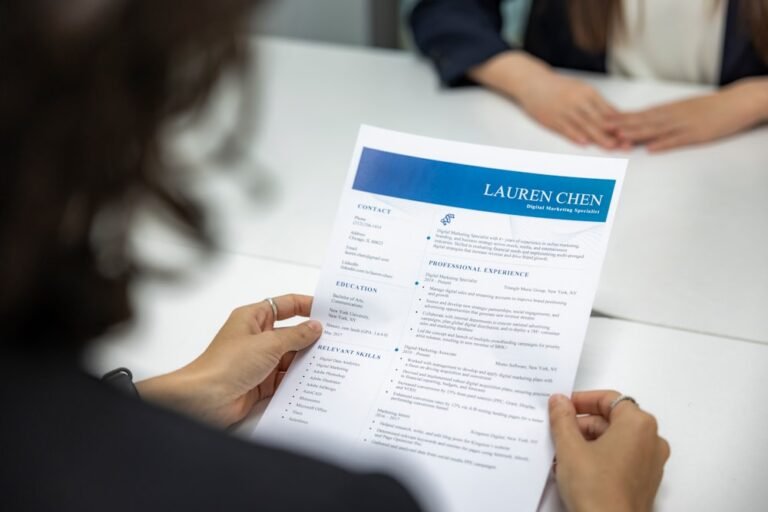 reviewing a resume at a table