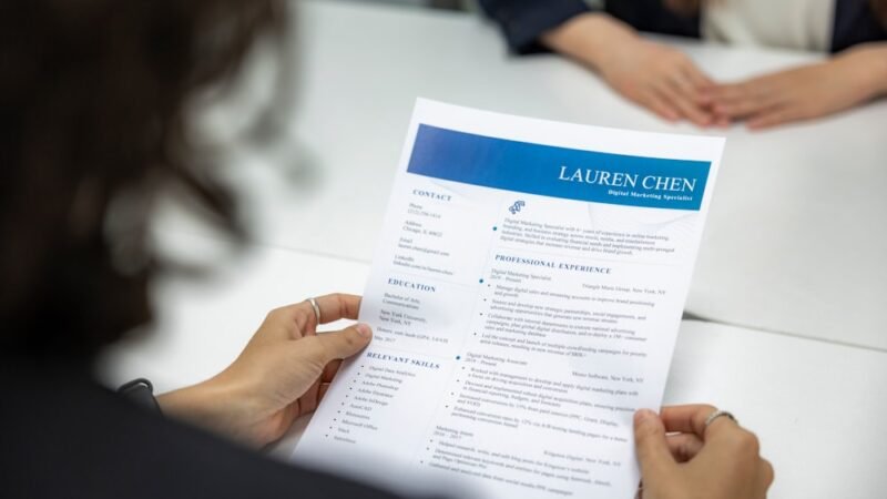 reviewing a resume at a table
